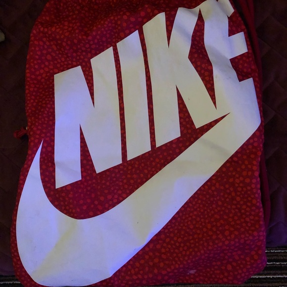 Nike Handbags - Nike pack pack.  Very clean and excellent condition.  Has orange design